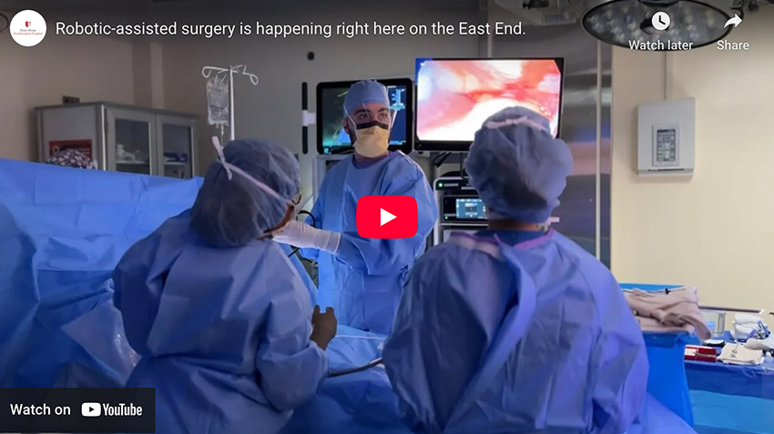 Our physicians with the da Vinci Xi surgical robot