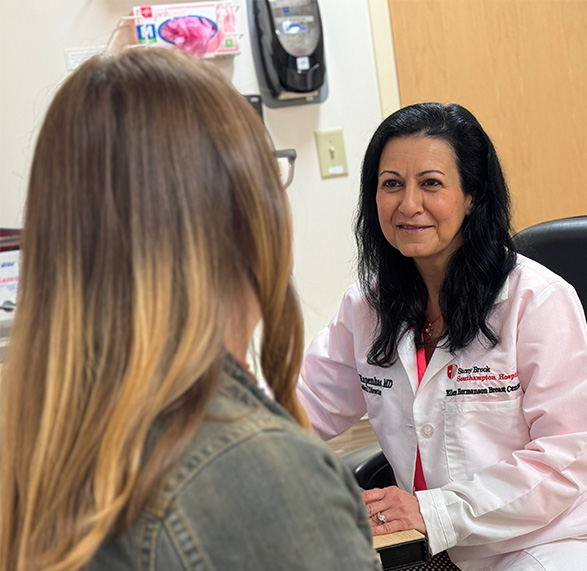 Physican speaking with patient at the Ellen Hermanson Breast Center